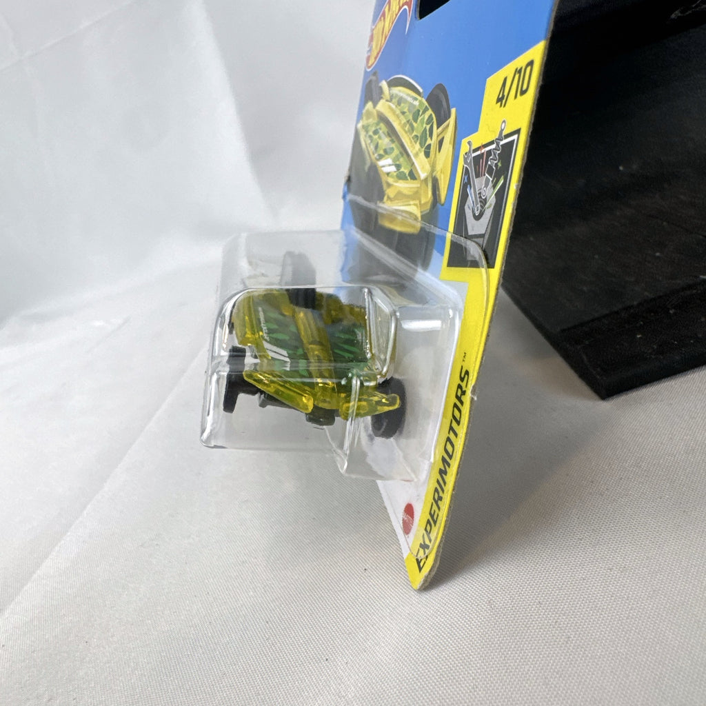 Hot Wheels 1:64 scale HW Formula Solar diecast car in translucent yellow on original blister card