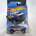 Hot Wheels 1987 Dodge D100 pickup truck in Race Team blue on blister card