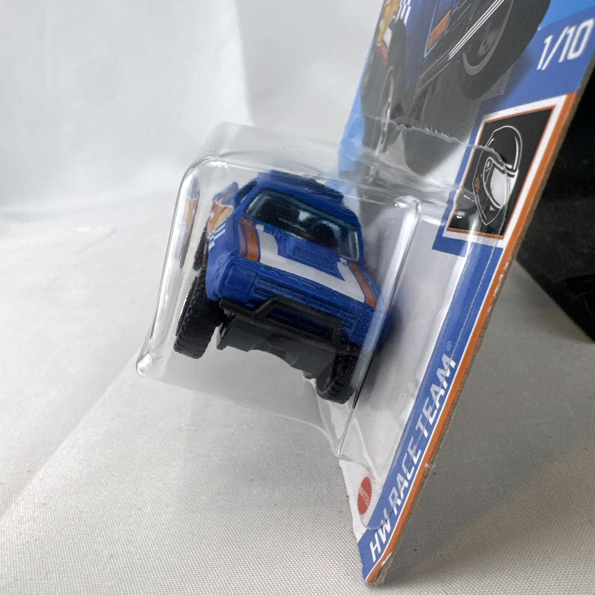 Hot Wheels 1987 Dodge D100 pickup truck in Race Team blue on blister card