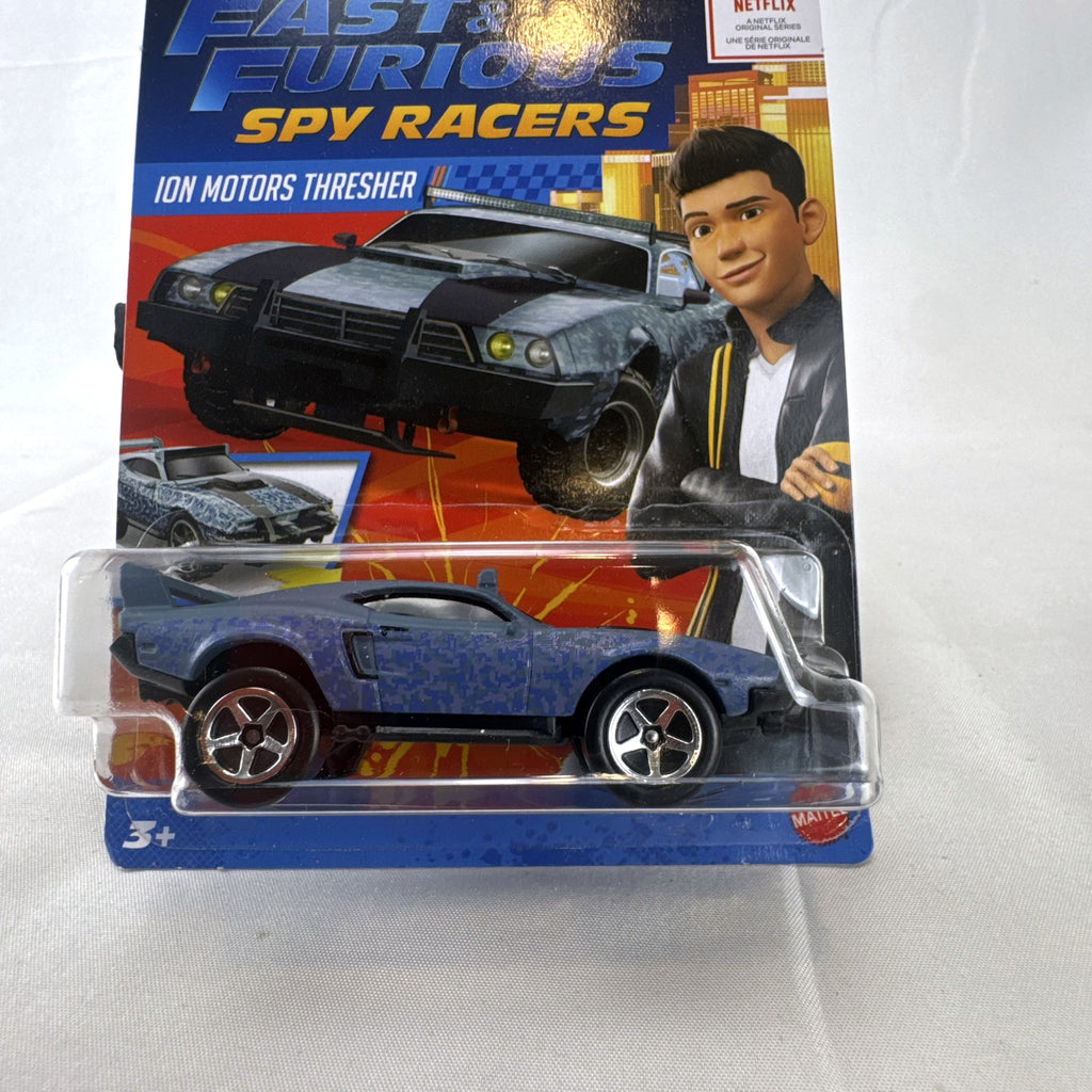 Hot Wheels 1:64 scale Fast & Furious Spy Racers Ion Motors Thresher diecast car in blue digital camo blister card