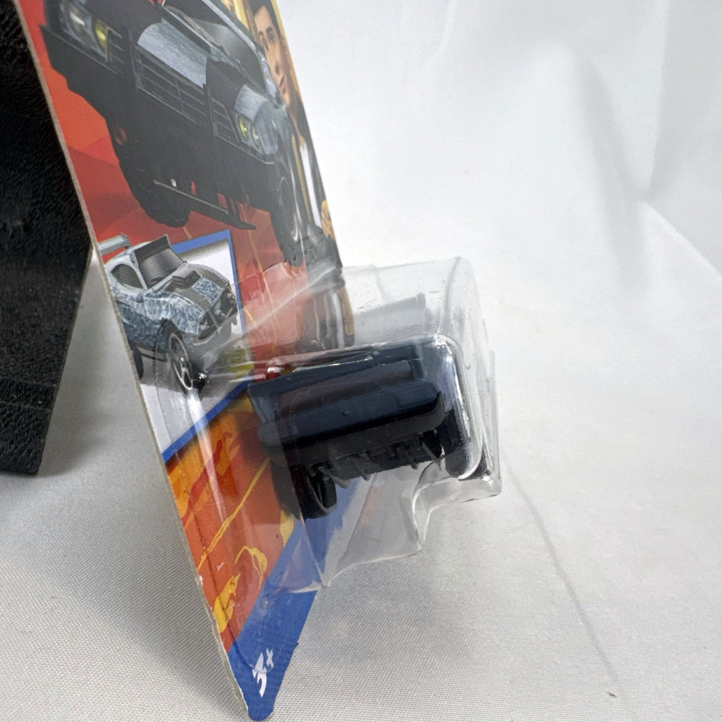 Hot Wheels 1:64 scale Fast & Furious Spy Racers Ion Motors Thresher diecast car in blue digital camo blister card