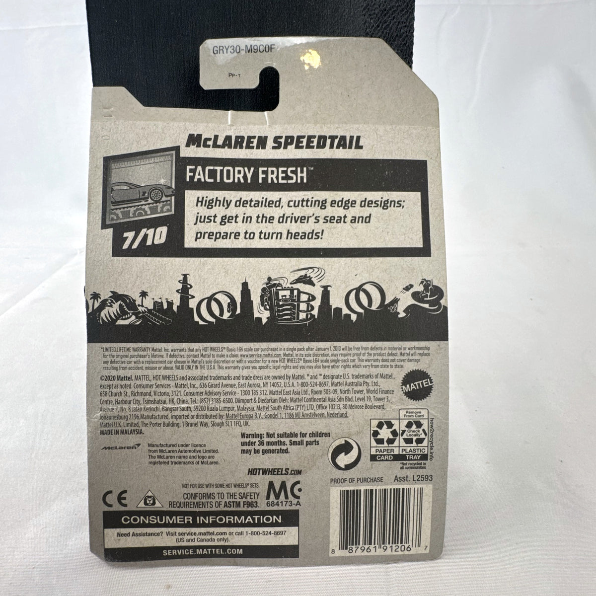Hot Wheels 1:64 scale 2020 McLaren Speedtail diecast car in metallic orange on original Factory Fresh blister card.