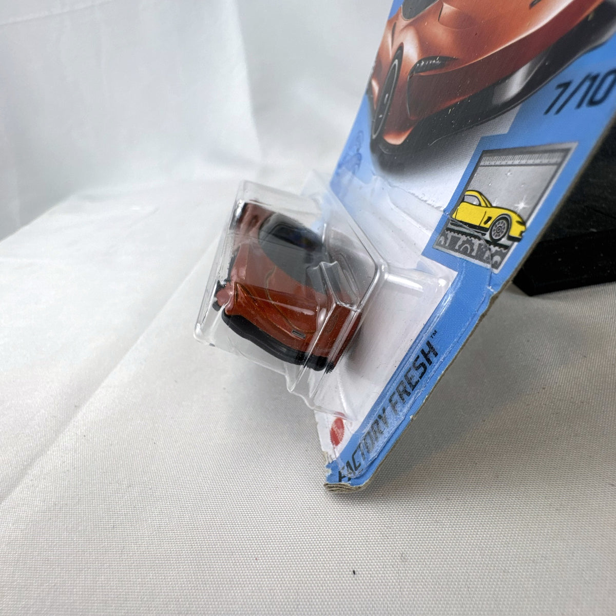 Hot Wheels McLaren Speedtail 1:64 die-cast car in metallic orange, factory sealed on original card.