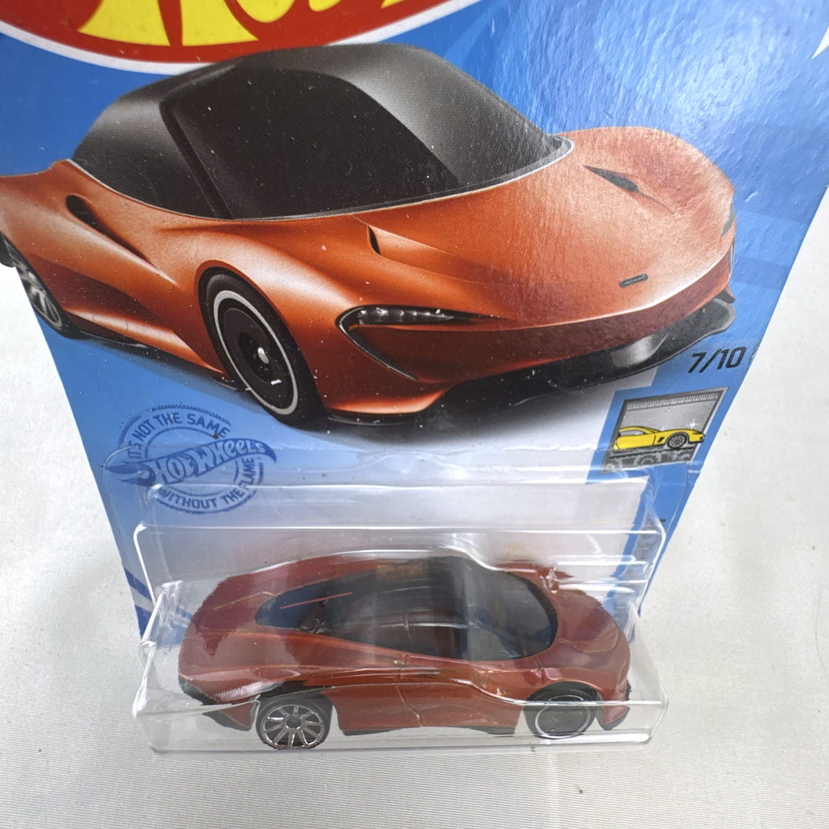 Hot Wheels McLaren Speedtail 1:64 die-cast car in metallic orange, factory sealed on original card.