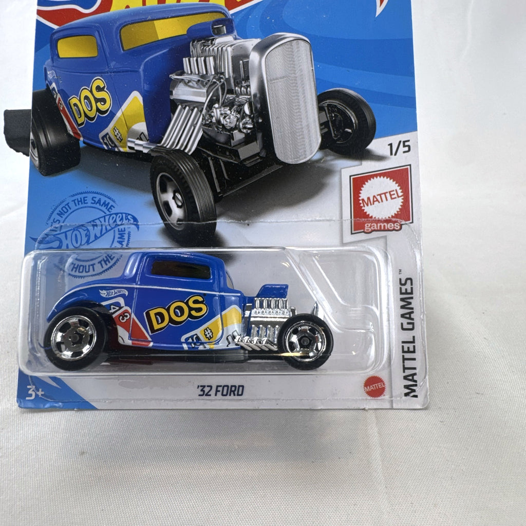 Sealed Hot Wheels 1932 Ford Coupe diecast car in blue with Mattel Games DOS card game graphics on original blister card.