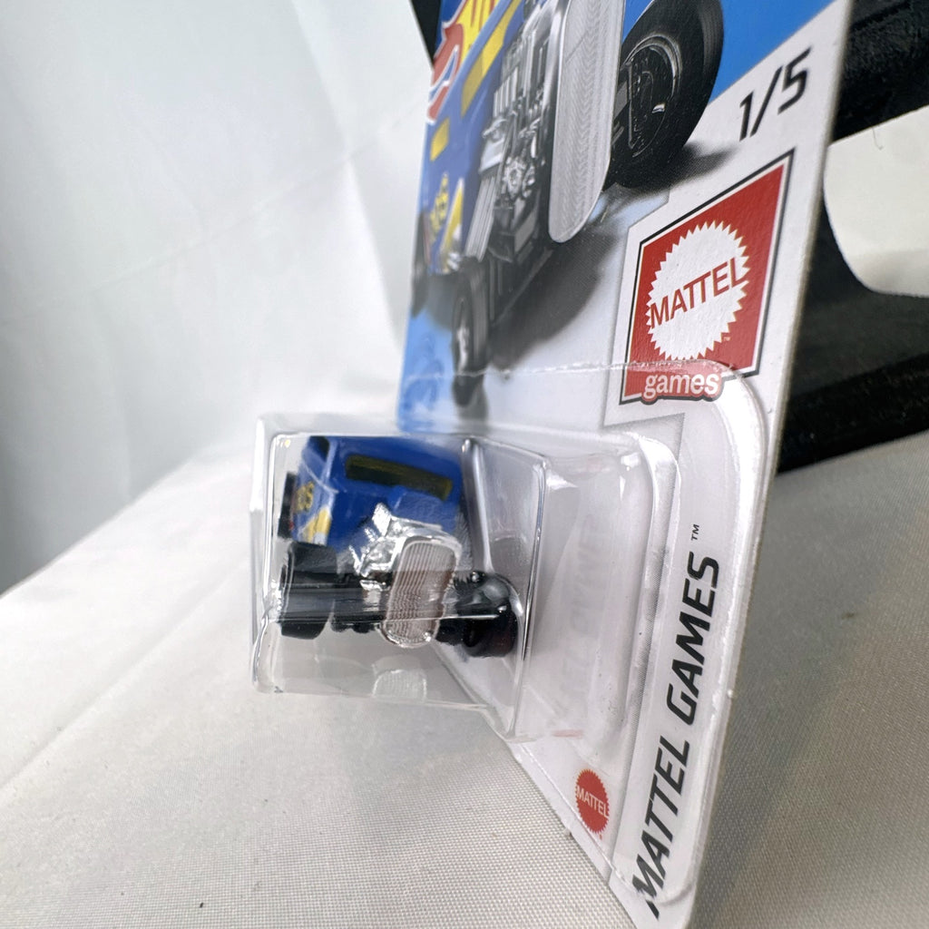 Sealed Hot Wheels 1932 Ford Coupe diecast car in blue with Mattel Games DOS card game graphics on original blister card.