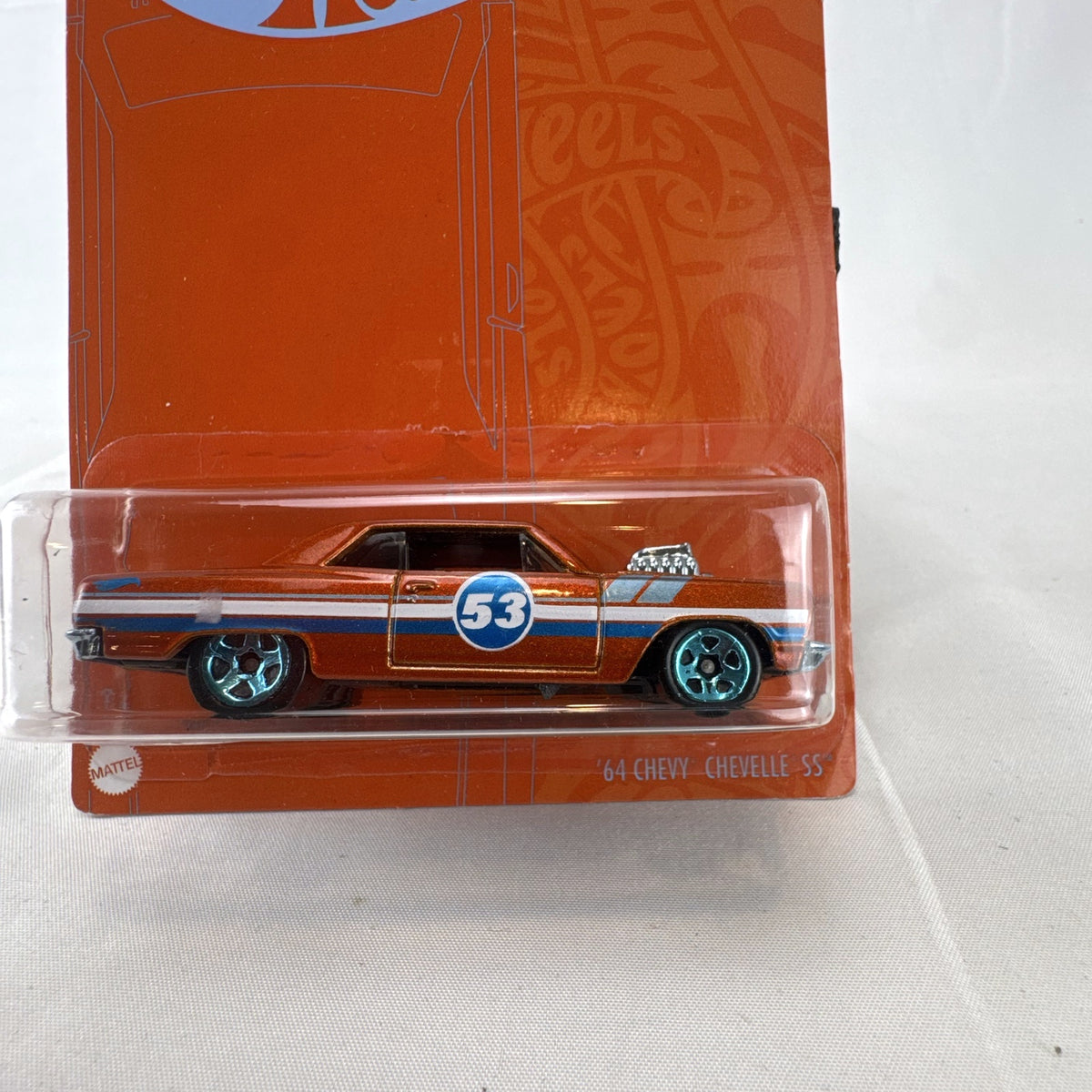 Hot Wheels 53rd Anniversary 1964 Chevrolet Chevelle SS 1:64 scale diecast car in metallic orange on blister card