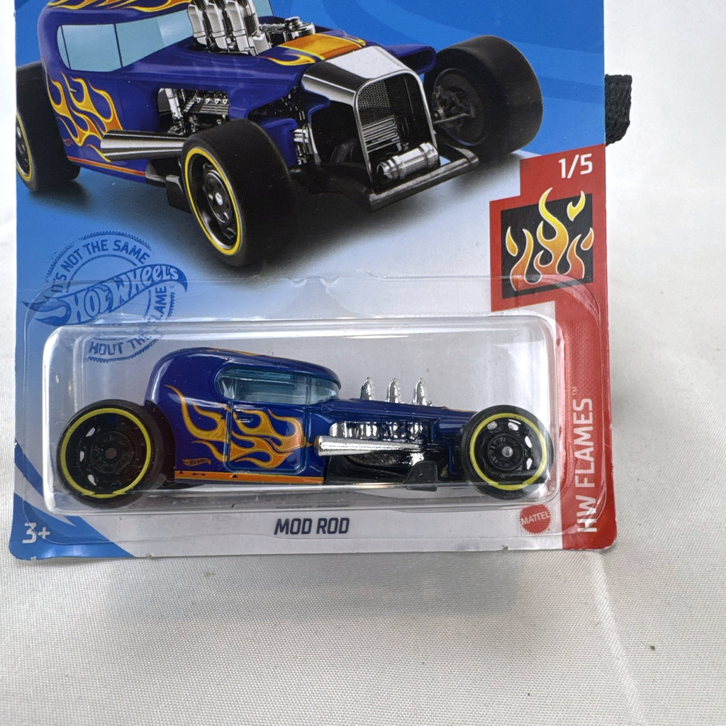 Hot Wheels Mod Rod 1:64 diecast car in blue with yellow and orange HW Flames graphics, sealed on card.