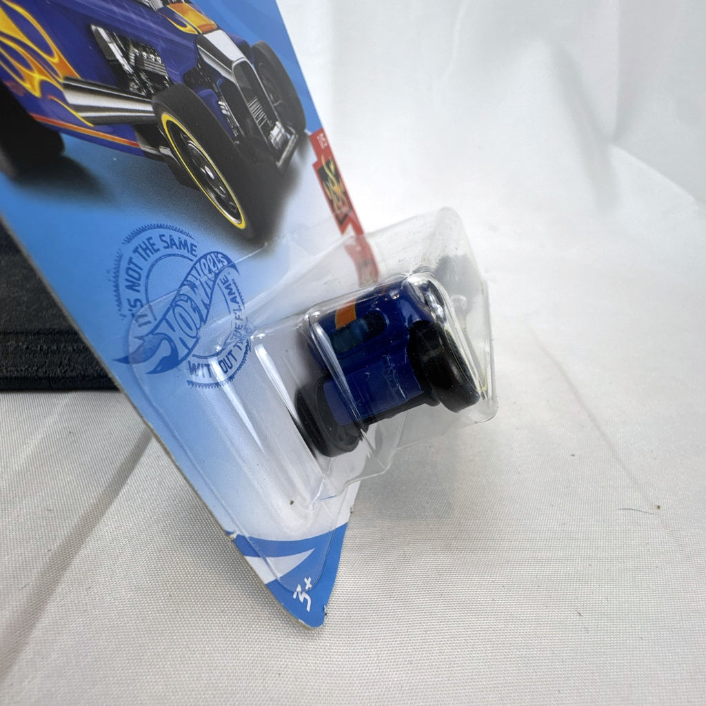 Hot Wheels Mod Rod 1:64 diecast car in blue with yellow and orange HW Flames graphics, sealed on card.