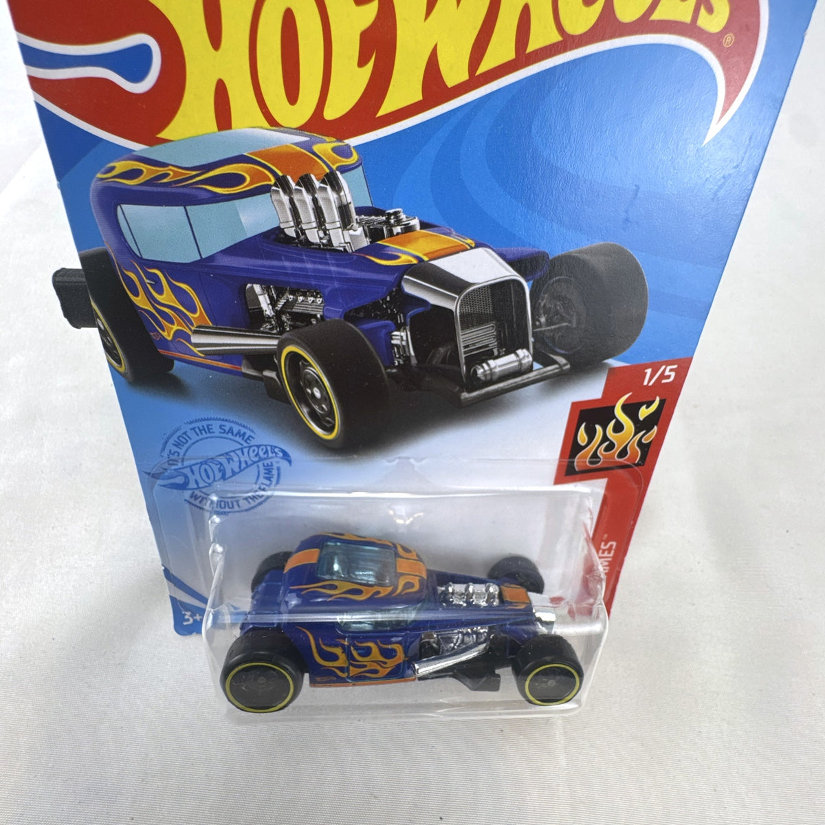 Hot Wheels Mod Rod diecast coupe in blue with HW Flames graphics sealed on card