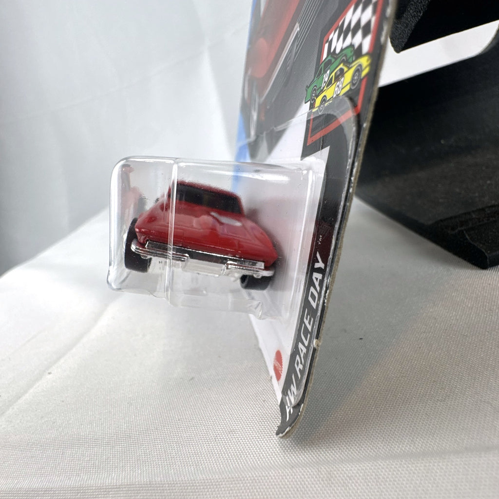 Hot Wheels 1964 Chevrolet Corvette Sting Ray 1:64 scale diecast car in red, sealed on original HW Race Day card package.