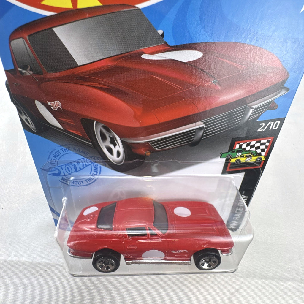 Hot Wheels 1964 Chevrolet Corvette Sting Ray 1:64 scale diecast car in red, sealed on original HW Race Day card package.