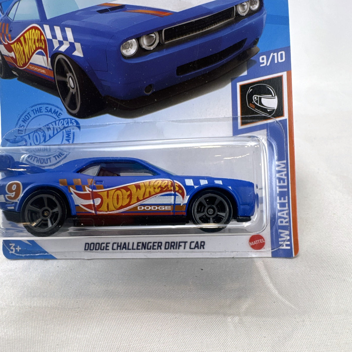 Hot Wheels 1:64 scale Dodge Challenger Drift Car in blue HW Race Team livery sealed on card