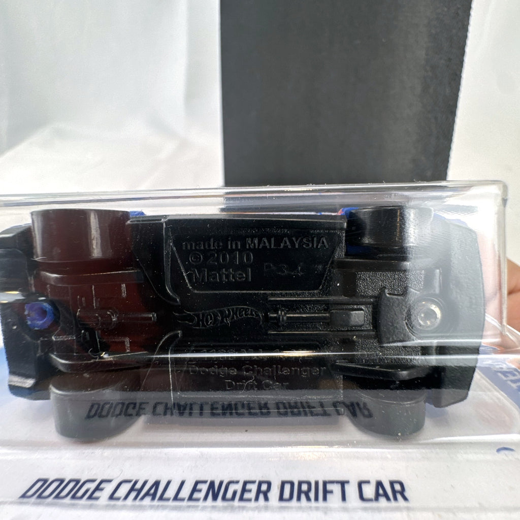 Hot Wheels 1:64 scale Dodge Challenger Drift Car in blue HW Race Team livery sealed on card