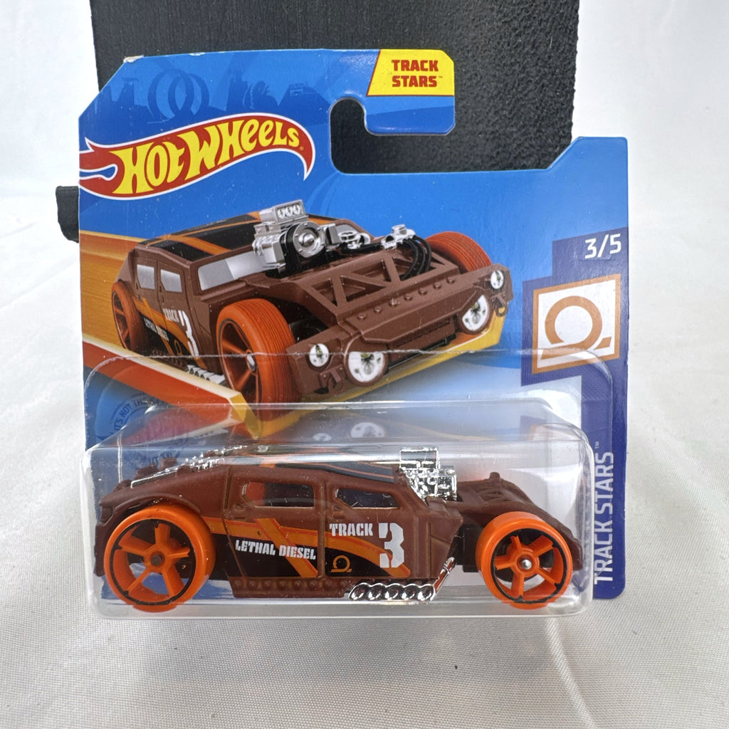 Sealed 2021 Hot Wheels Lethal Diesel diecast model car in matte brown with orange graphics and exposed twin turbo engine.