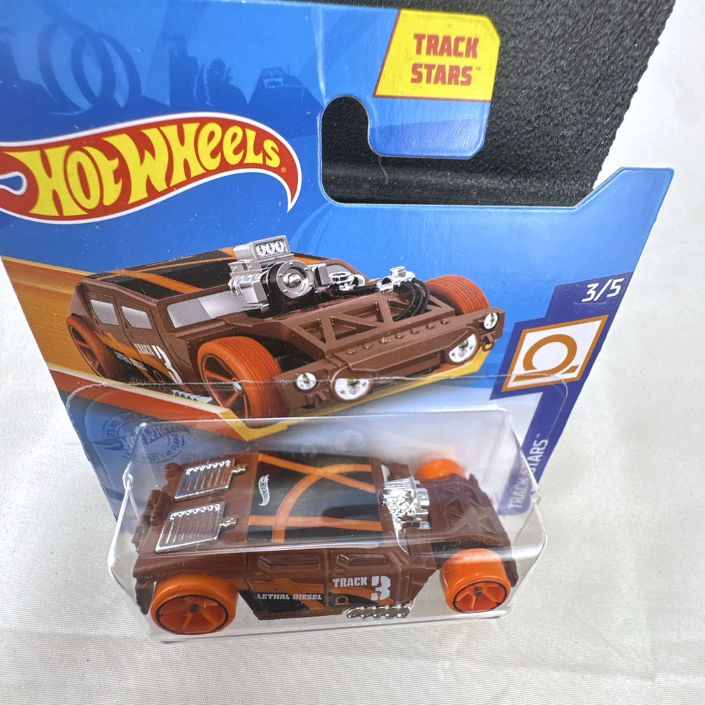 Sealed 2021 Hot Wheels Lethal Diesel diecast model car in matte brown with orange graphics and exposed twin turbo engine.