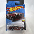 Hot Wheels Triumph TR6 HW Race Day diecast car in deep maroon red with racing stripes in original blister card packaging