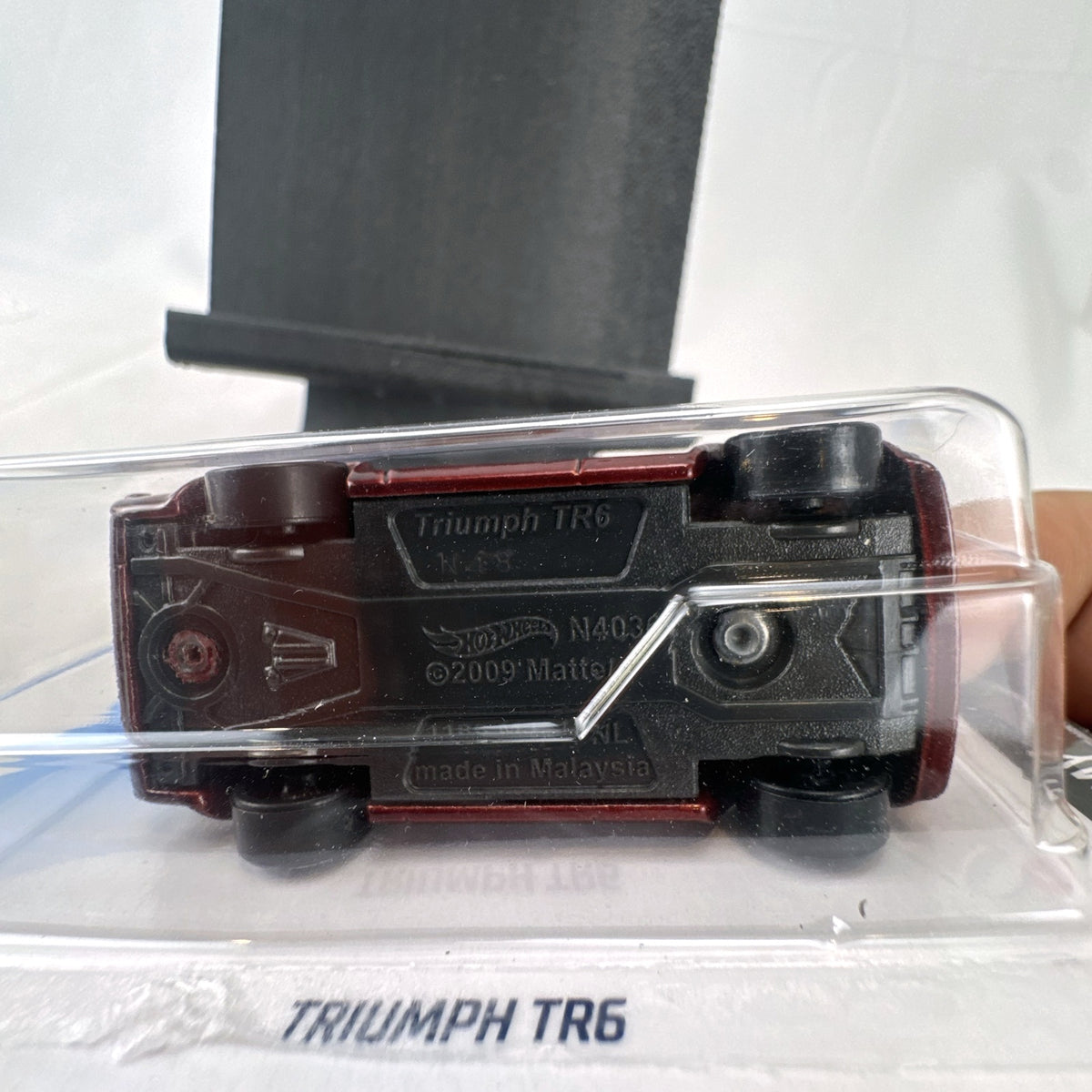 Hot Wheels 2021 HW Race Day Triumph TR6 diecast car in maroon red on original blister card