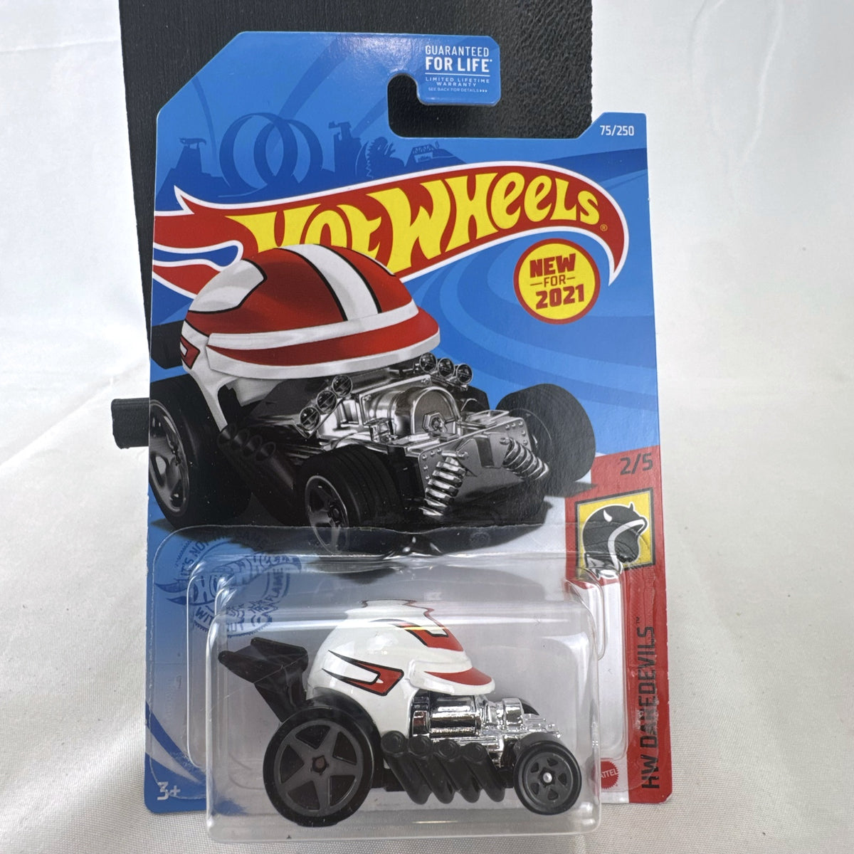 Hot Wheels 2021 Head Gasket white helmet diecast hot rod car in sealed original blister card packaging.