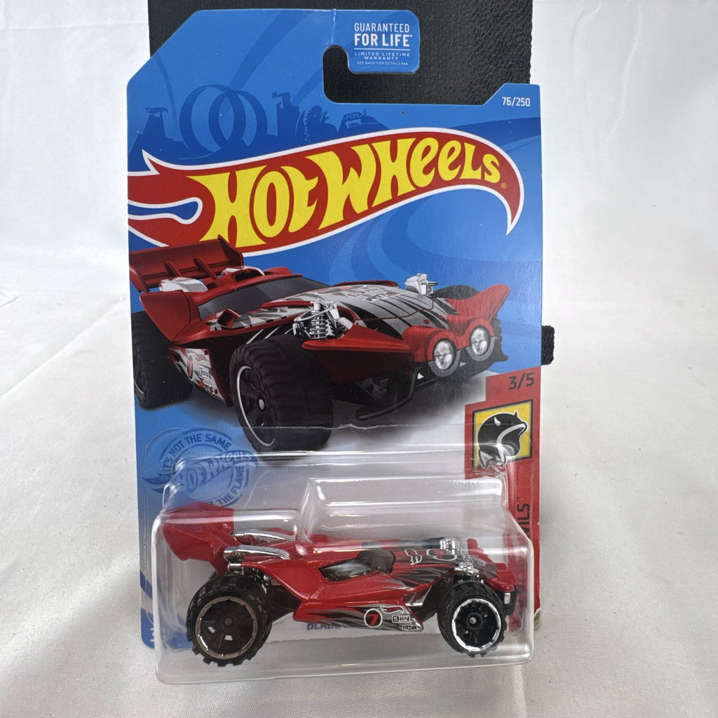 Sealed 2021 Hot Wheels Blade Raider red stunt buggy die-cast vehicle in original blister card packaging.