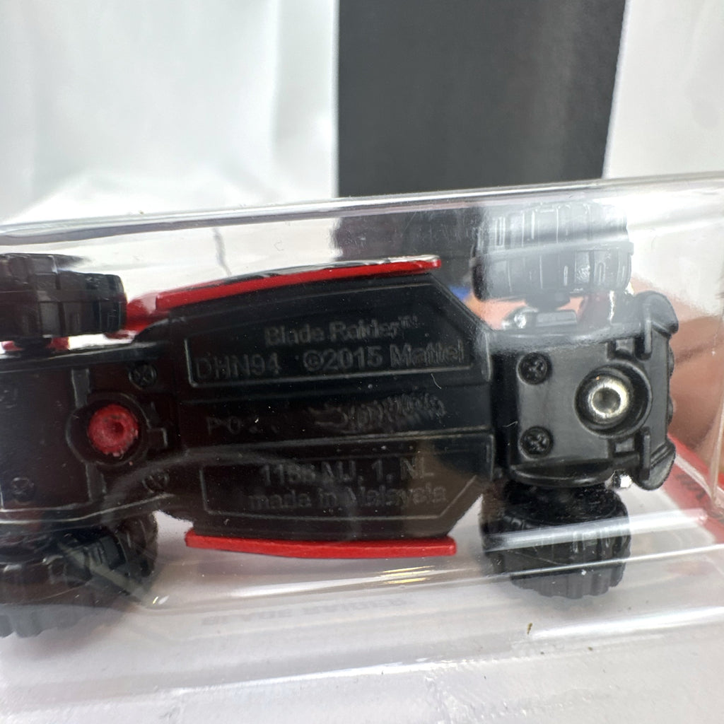 Sealed 2021 Hot Wheels Blade Raider red stunt buggy die-cast vehicle in original blister card packaging.