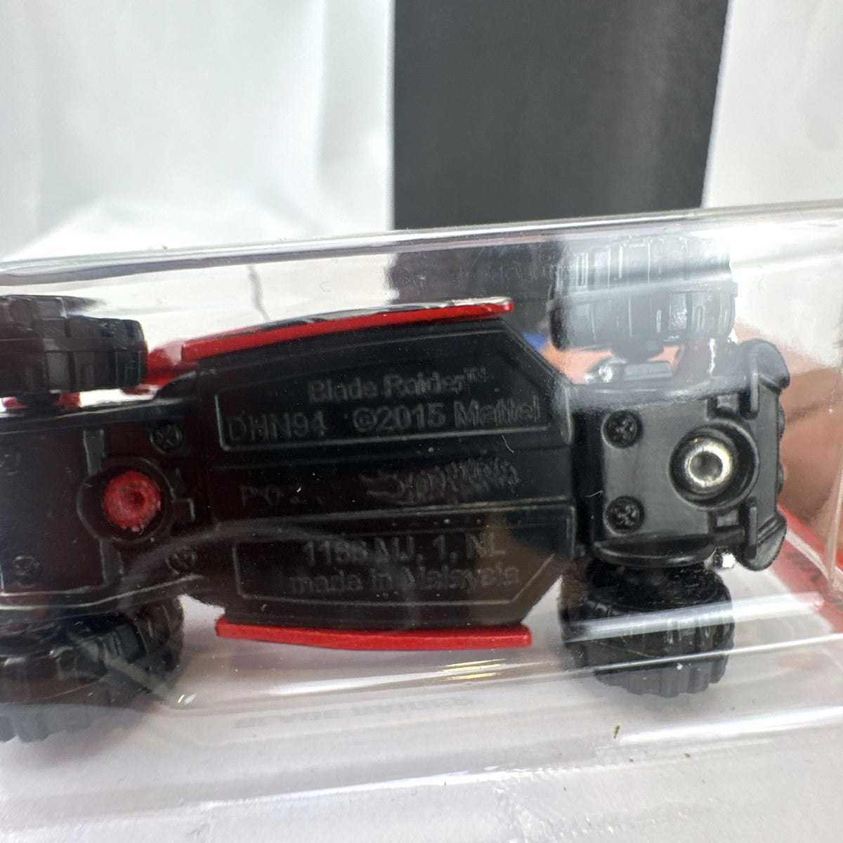 Sealed 2021 Hot Wheels Blade Raider red stunt buggy die-cast vehicle in original blister card packaging.