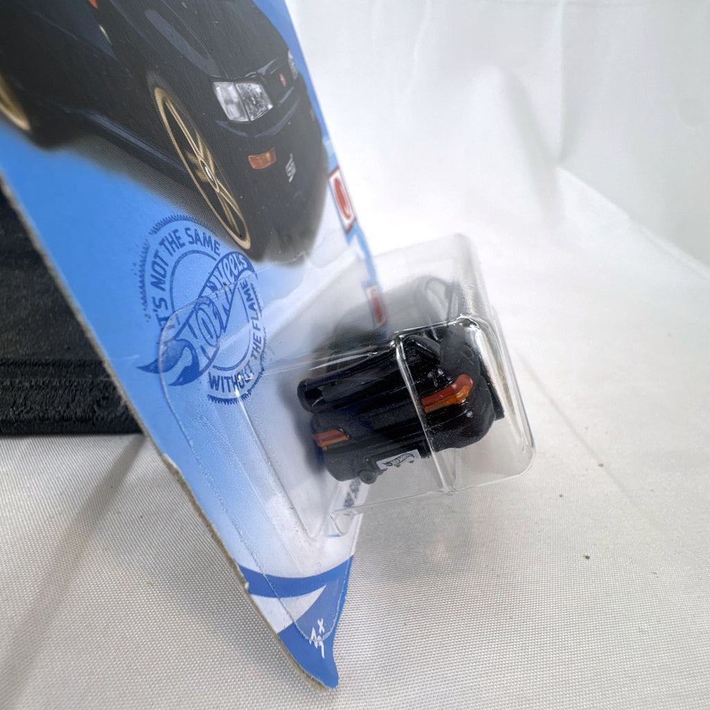 Hot Wheels 1998 Subaru Impreza 22B STi 1:64 scale diecast car in metallic blue on original card