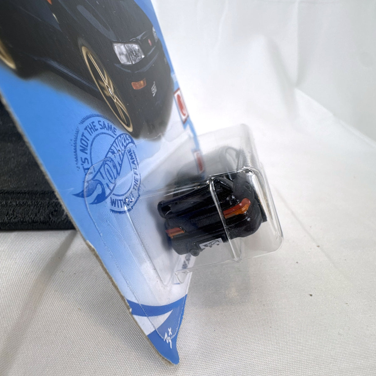 Hot Wheels 1998 Subaru Impreza 22B STi 1:64 scale diecast car in metallic blue on original card
