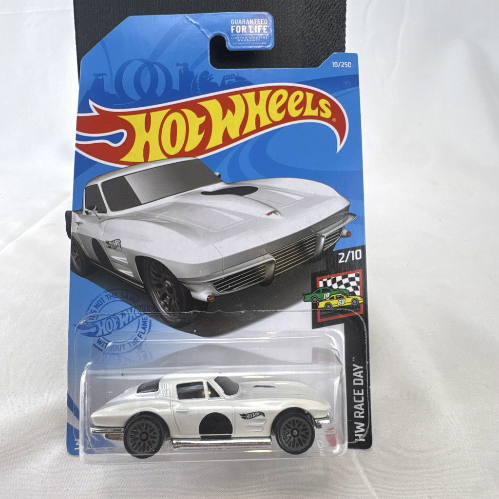 Sealed Hot Wheels 1964 Chevy Corvette Sting Ray HW Race Day 1:64 scale diecast car in white