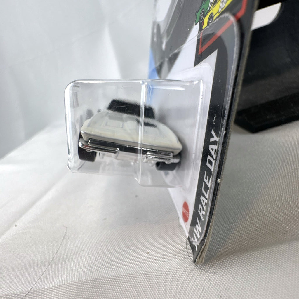 Sealed Hot Wheels 1964 Chevy Corvette Sting Ray HW Race Day 1:64 scale diecast car in white