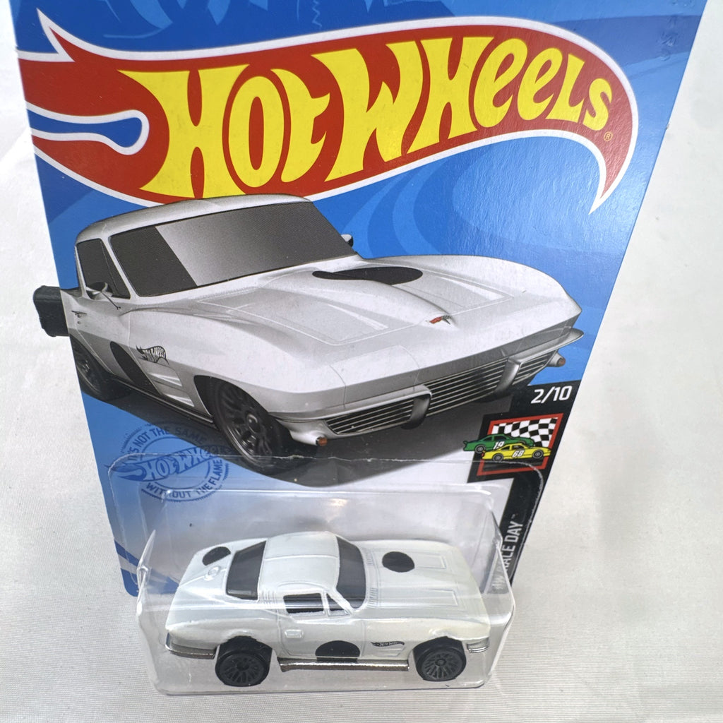 Sealed Hot Wheels 1964 Chevy Corvette Sting Ray HW Race Day 1:64 scale diecast car in white
