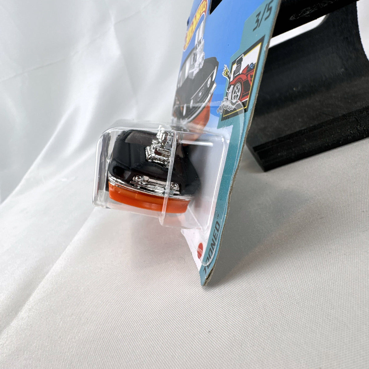 Hot Wheels 1968 Ford Mustang Tooned diecast car in black on short card blister pack
