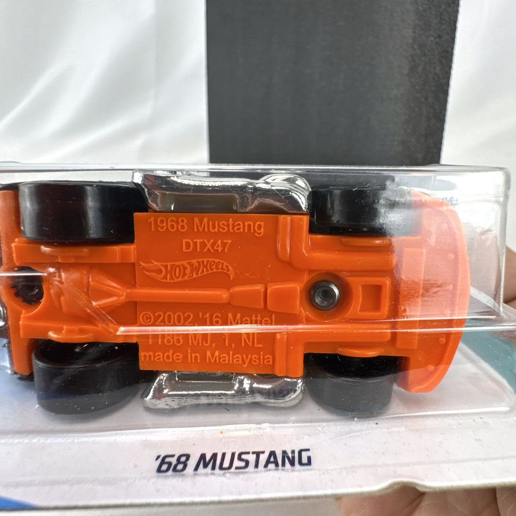 Hot Wheels 1968 Ford Mustang Tooned diecast car in black on short card blister pack