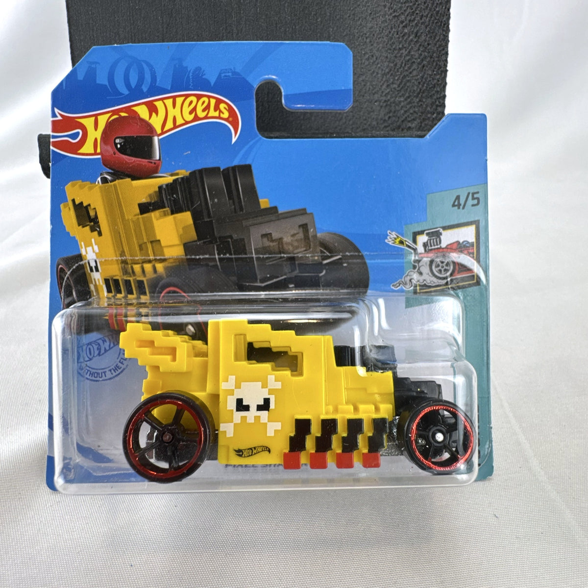 Hot Wheels Pixel Shaker 1:64 scale yellow diecast car in original sealed blister pack