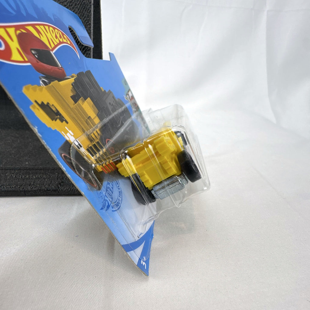 Hot Wheels Pixel Shaker 1:64 scale yellow diecast car in original sealed blister pack