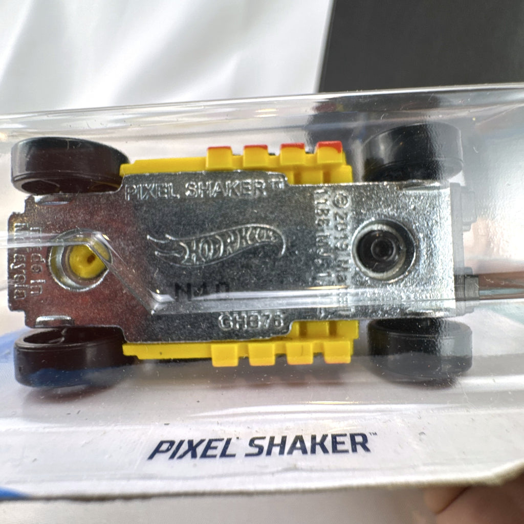 Hot Wheels Pixel Shaker 1:64 scale yellow diecast car in original sealed blister pack