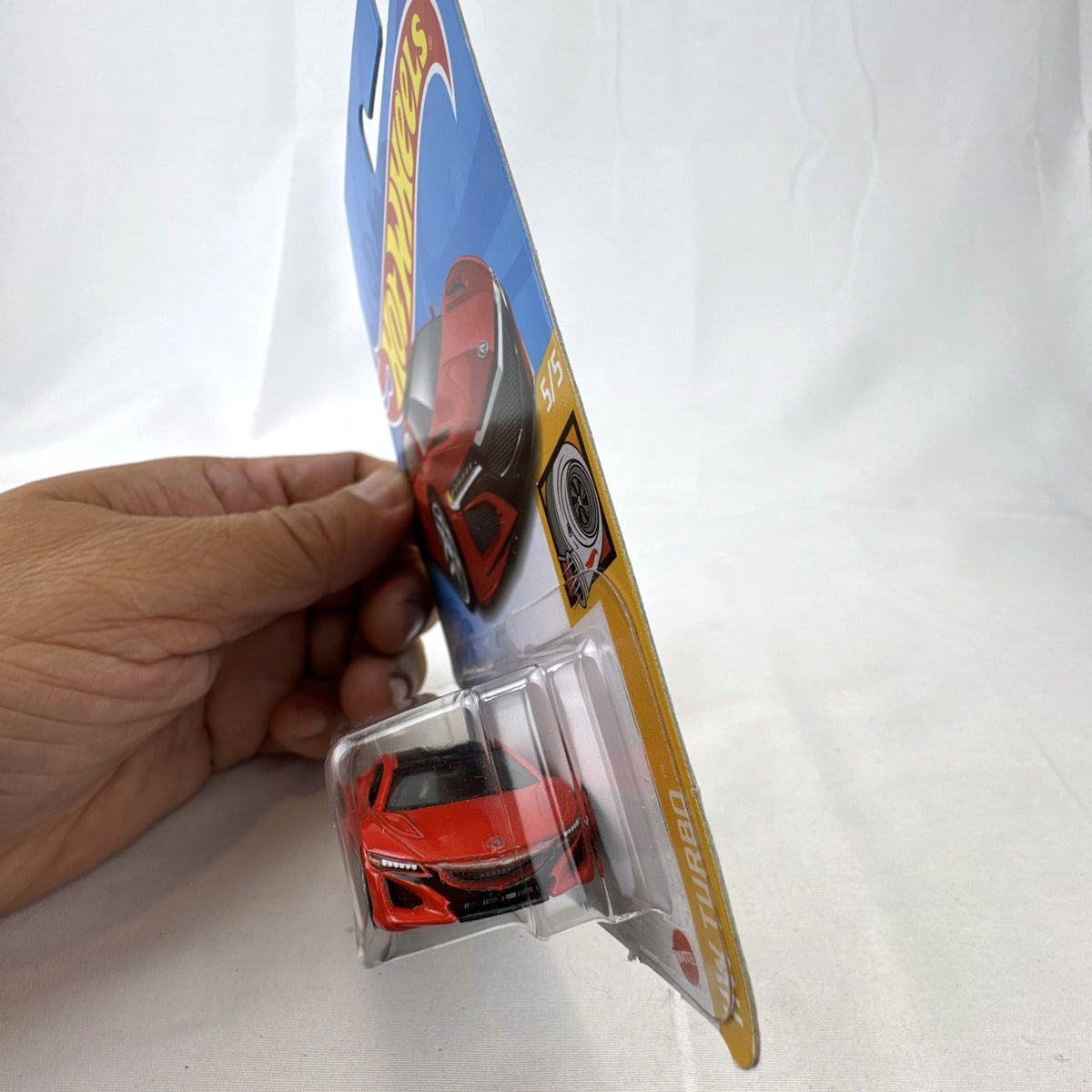 Hot Wheels 2017 Acura NSX 1:64 scale diecast car in gloss red on original blister card