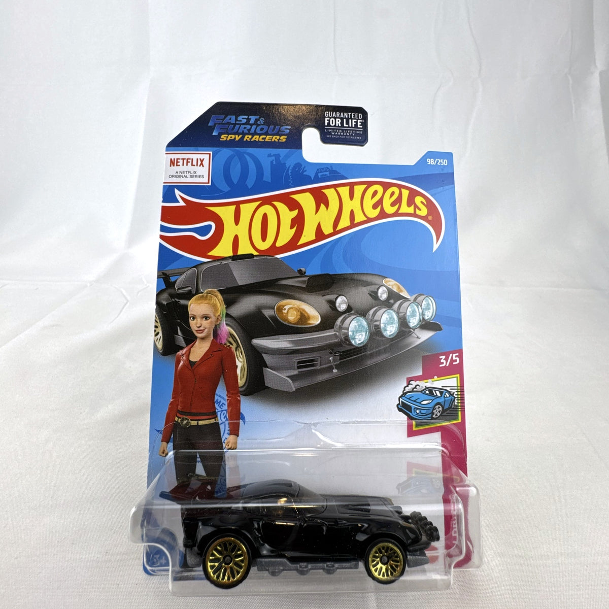 Hot Wheels Astana Hotto 1:64 scale diecast car in black with gold rims, sealed on Fast & Furious Spy Racers card