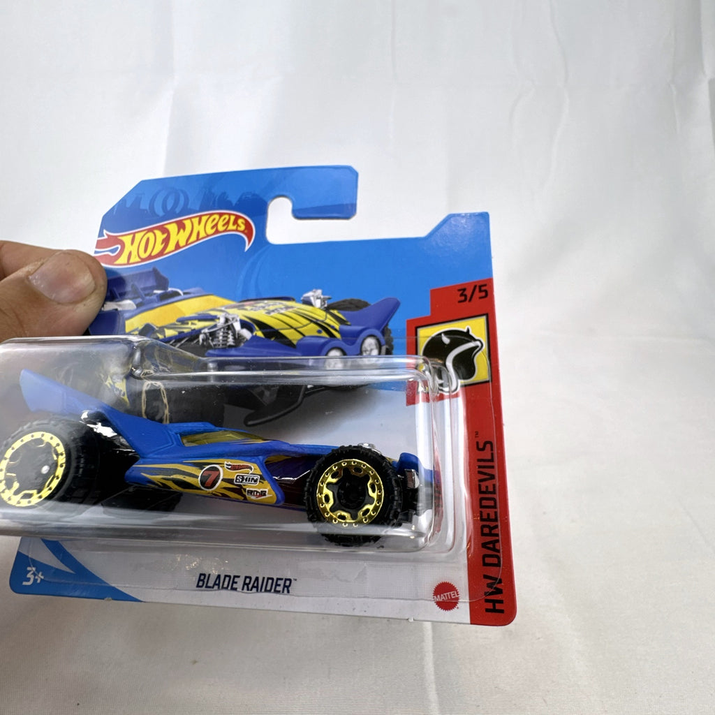 Hot Wheels Blade Raider off-road buggy diecast in blue from the 2021 HW Daredevils series, unopened in card package.