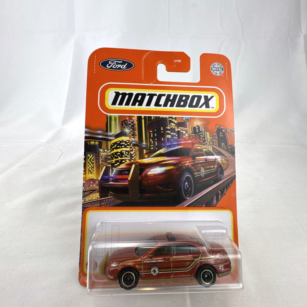 Matchbox 1:64 scale red metallic Ford Police Interceptor Fire Chief diecast car sealed on original card