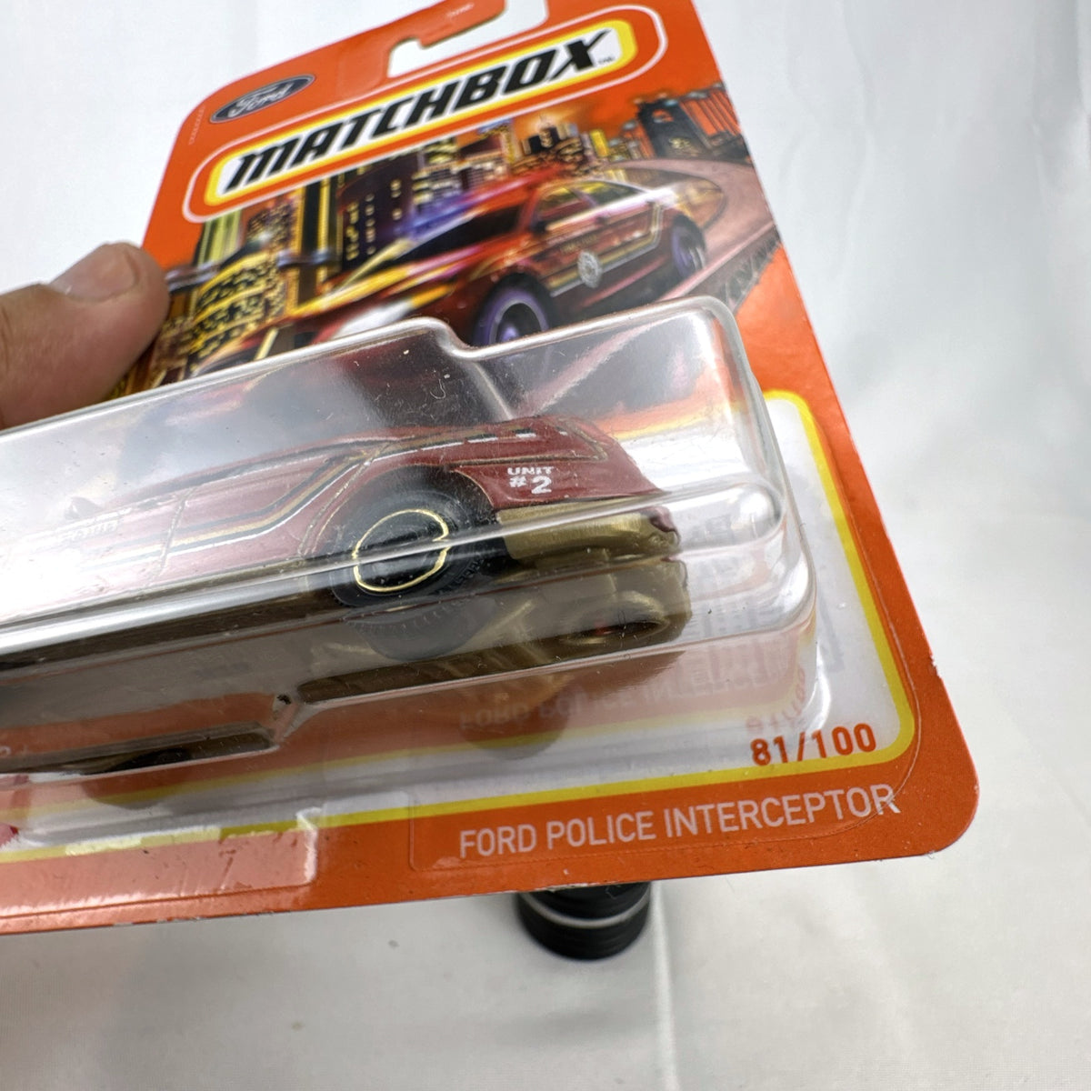 Matchbox 1:64 scale red metallic Ford Police Interceptor Fire Chief diecast car sealed on original card