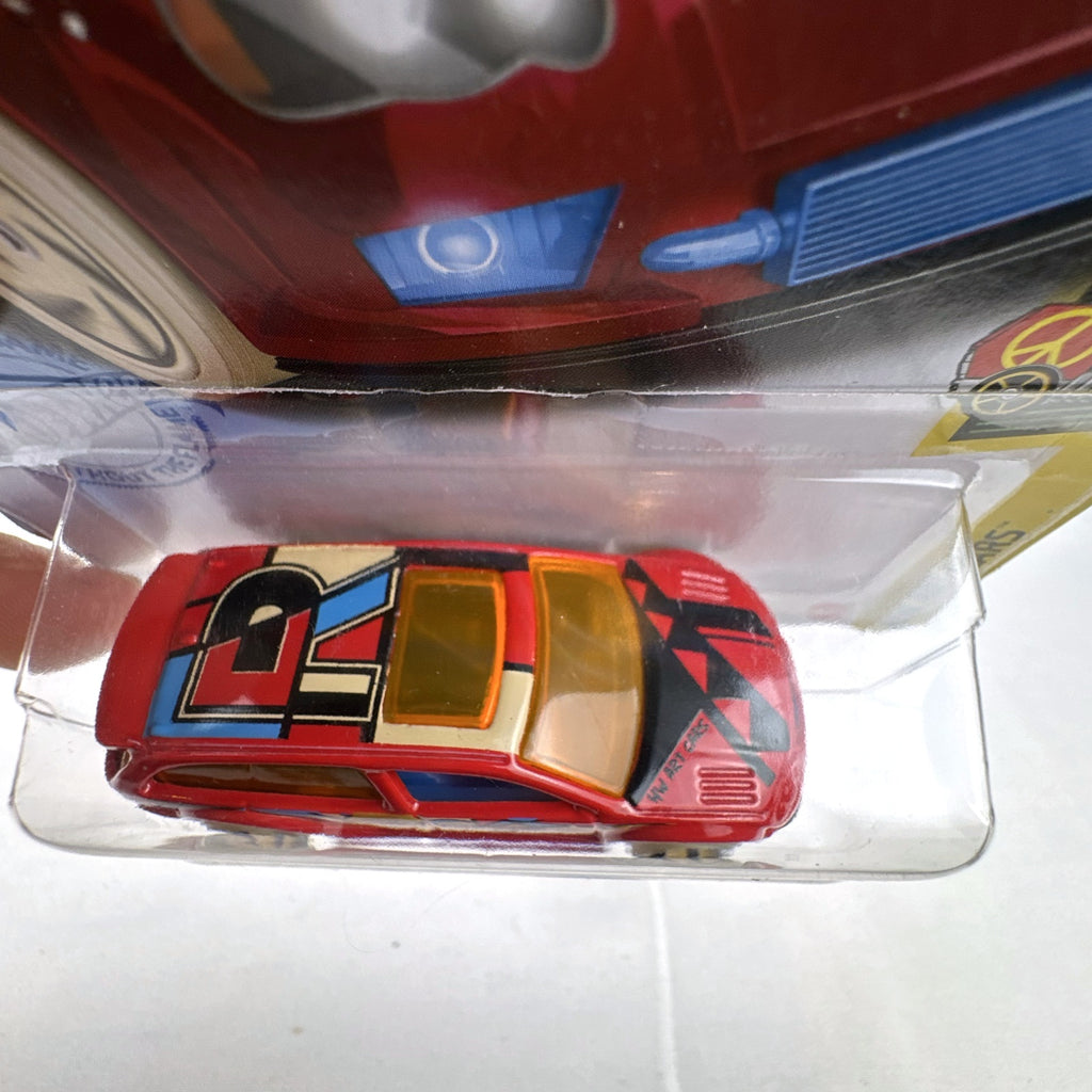 Hot Wheels 1:64 scale Audacious diecast wagon in red with HW Art Cars graphics sealed on card