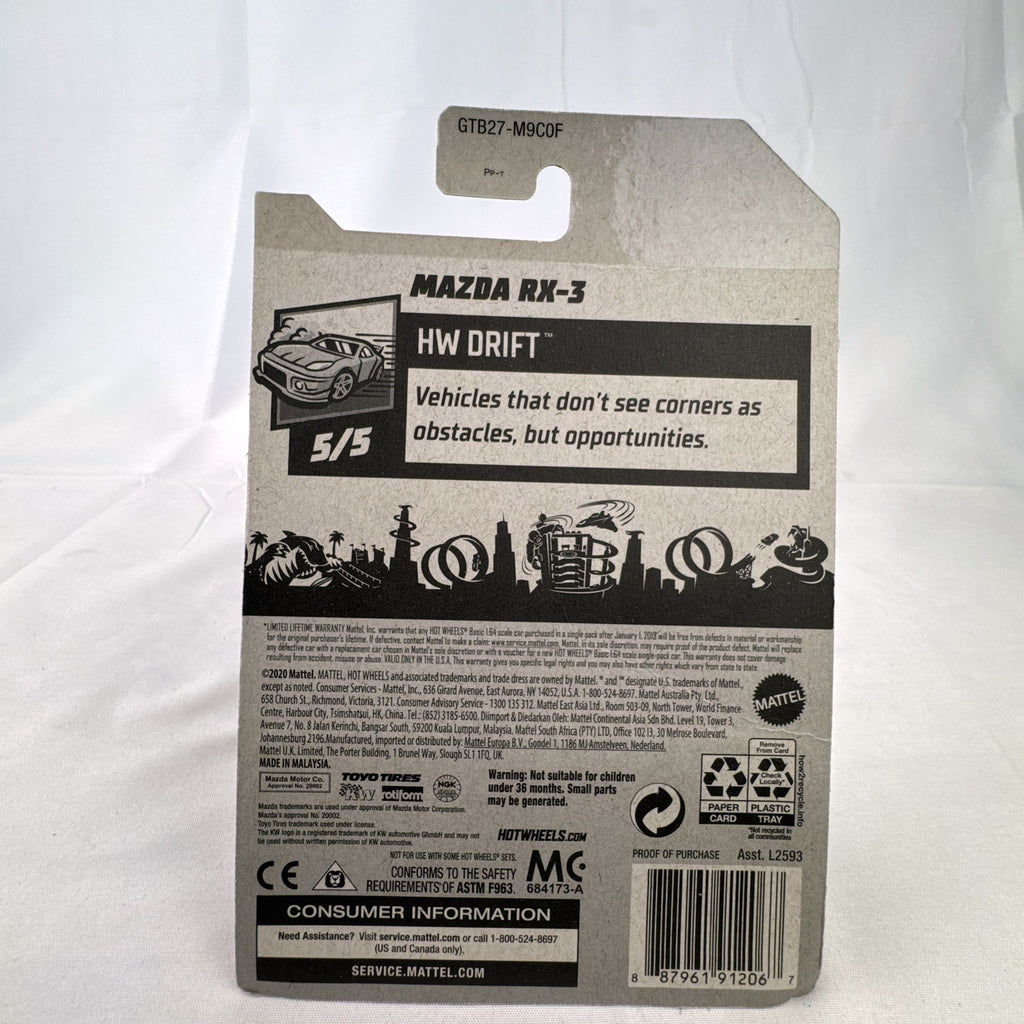White Hot Wheels 1:64 scale Mazda RX-3 diecast car in Mad Mike HW Drift livery sealed on card.