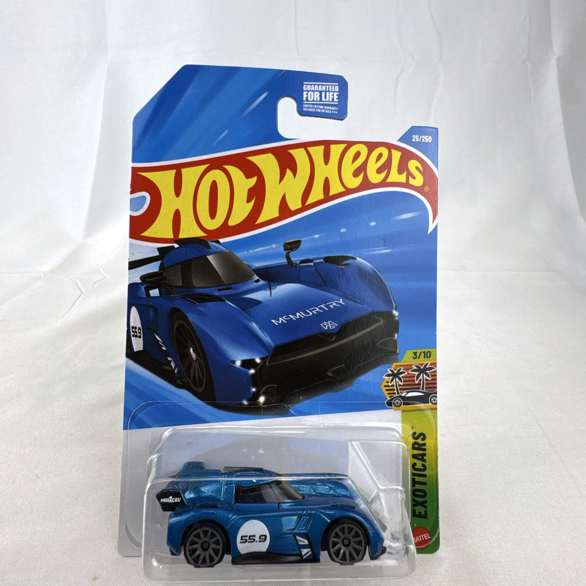 Hot Wheels McMurtry Speirling 1:64 scale diecast car in metallic blue, factory sealed on card