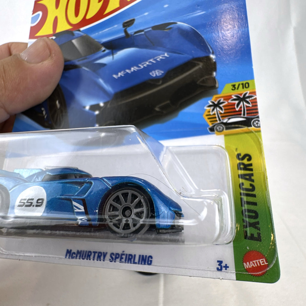 Hot Wheels McMurtry Speirling 1:64 scale diecast car in metallic blue, factory sealed on card