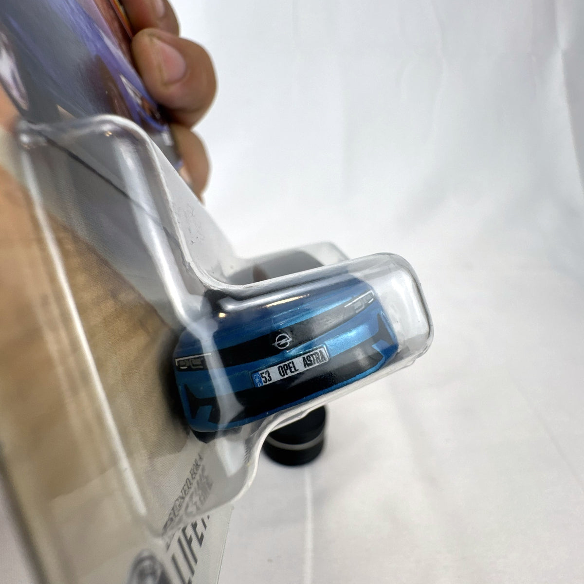 Matchbox 2022 Opel Astra 1:64 scale diecast car in metallic blue with black roof, factory sealed on blister card
