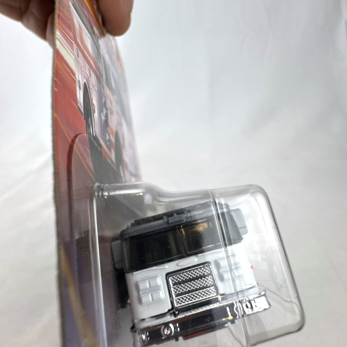 Matchbox Pierce Arrow XT Fire Engine diecast truck in white and grey, factory sealed on original card 104/125.
