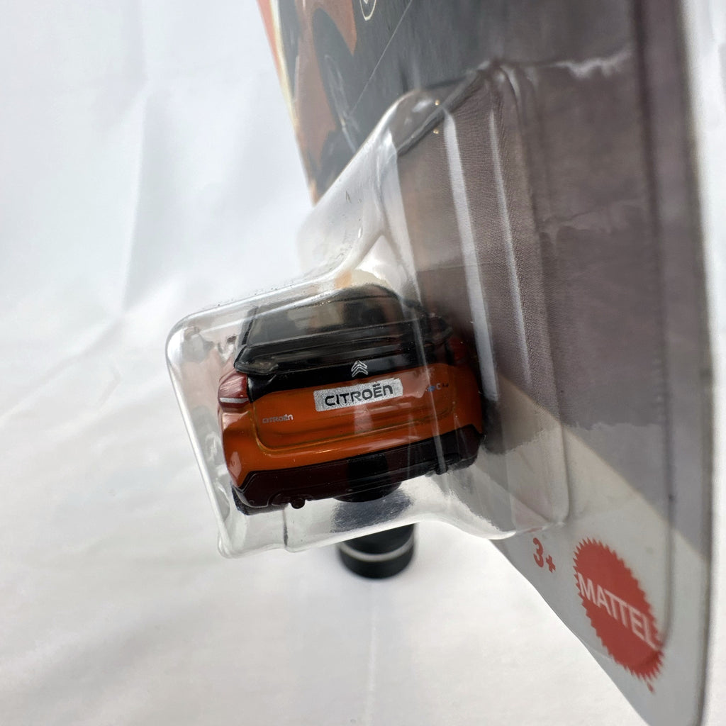 Sealed Matchbox 2023 Citroën ë-C4 1:64 scale diecast car in metallic orange on original packaging