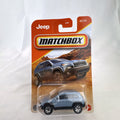Matchbox 2014 Jeep Cherokee Trailhawk light blue 1:64 scale diecast model car sealed on original card