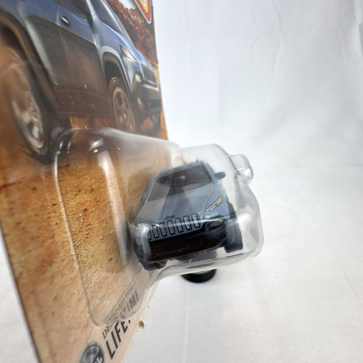 Matchbox 2014 Jeep Cherokee Trailhawk light blue 1:64 scale diecast model car sealed on original card